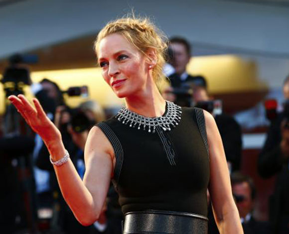 إطلالات براقة في مهرجان البندقية السينمائي 2014... بالصور