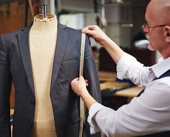 9 طرق يمكن أن يستخدمها الخياط لجعلك تبدو أفضل