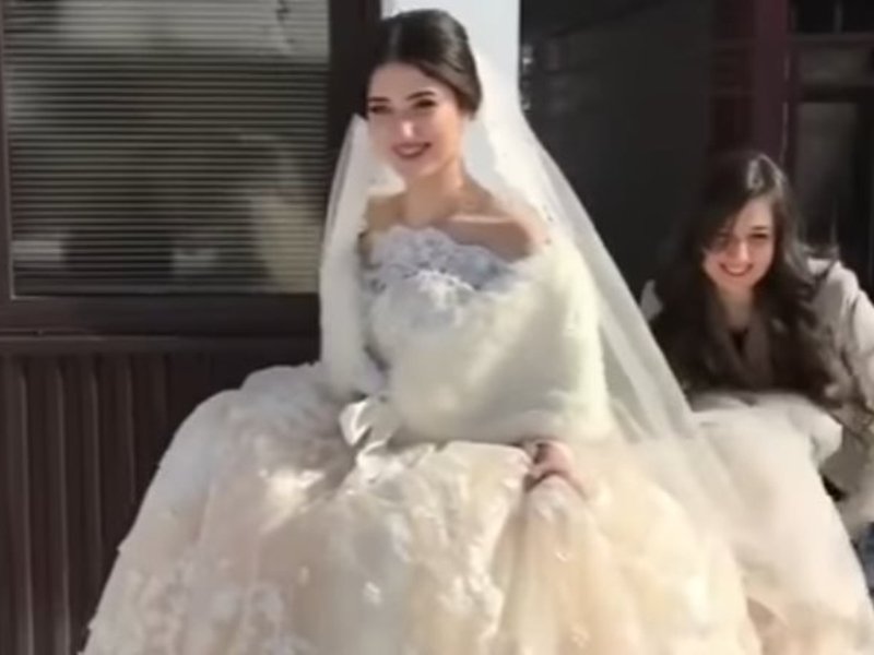اضغط لمشاهدة الفيديو: جمال عروسة شيشانية يضع المصور في موقف محرج!