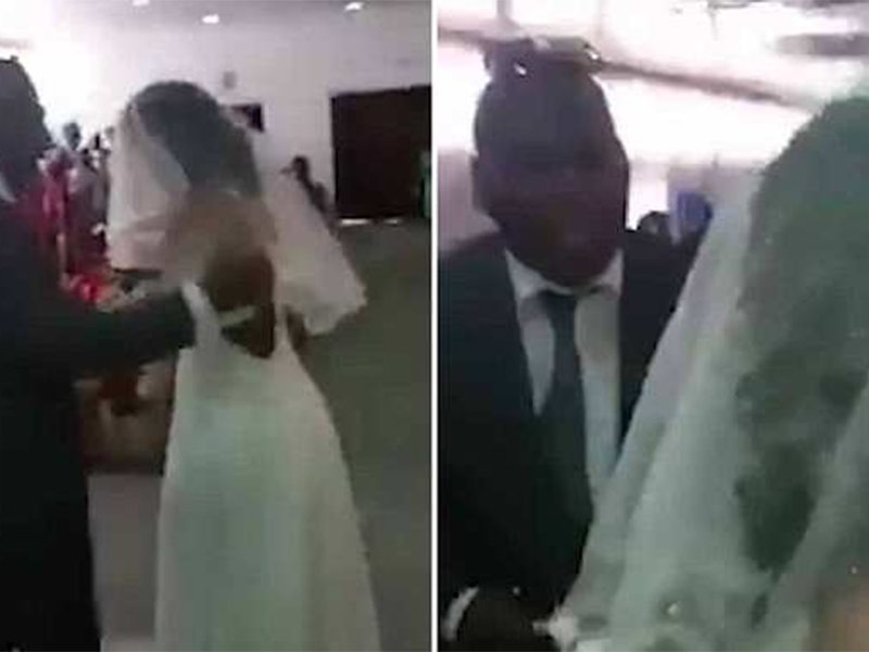 اضغط لمشاهدة الفيديو: امرأة بفستان الزفاف تقتحم حفل زفاف حبيبها على امرأة أخرى!