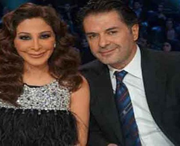 تعليقاً على حضنه لـ اليسا ..راغب علامة يقول: "بدفيها"
