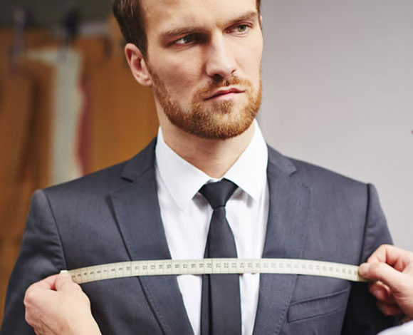 9 طرق يمكن أن يستخدمها الخياط لجعلك تبدو أفضل