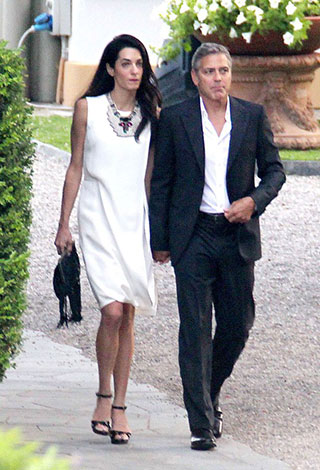 جورج كلوني يختار أرماني لتصميم بذلة زفافه 