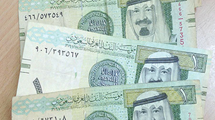 السعودية لن تستبدل الريال الورقي بالمعدني