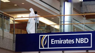 "بنك الإمارات دبي الوطني" يدمج بشبكته الصراف الآلي التابع لـ"مصرف دبي"