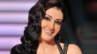 هل حاول نائب عراقي ثمل تقبيل غادة عبد الرازق؟