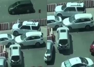 شاهد هذه السيدة وهي تخرج سائقها من مأزق بالسيارة