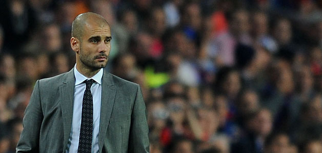 غوارديولا يبلغ لاعبي برشلونة برحيله